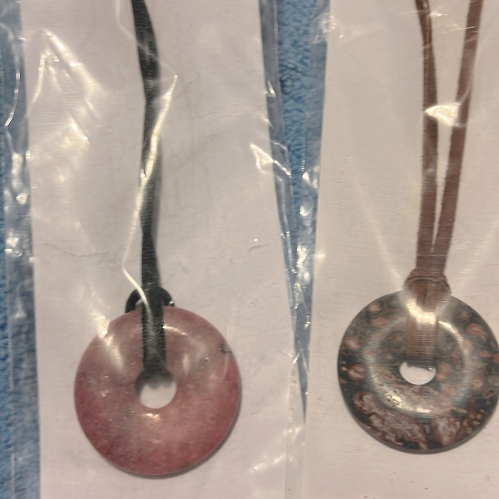 Two 18” leather strap donut necklaces